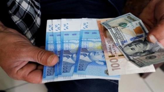 البنك المغربي : سعر الدرهم في تحسن مقابل الدولار الامريكي